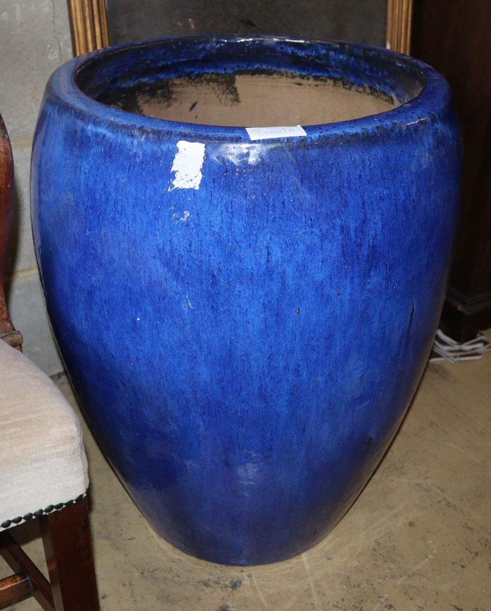 A large blue glazed garden planter, 48cm diameter